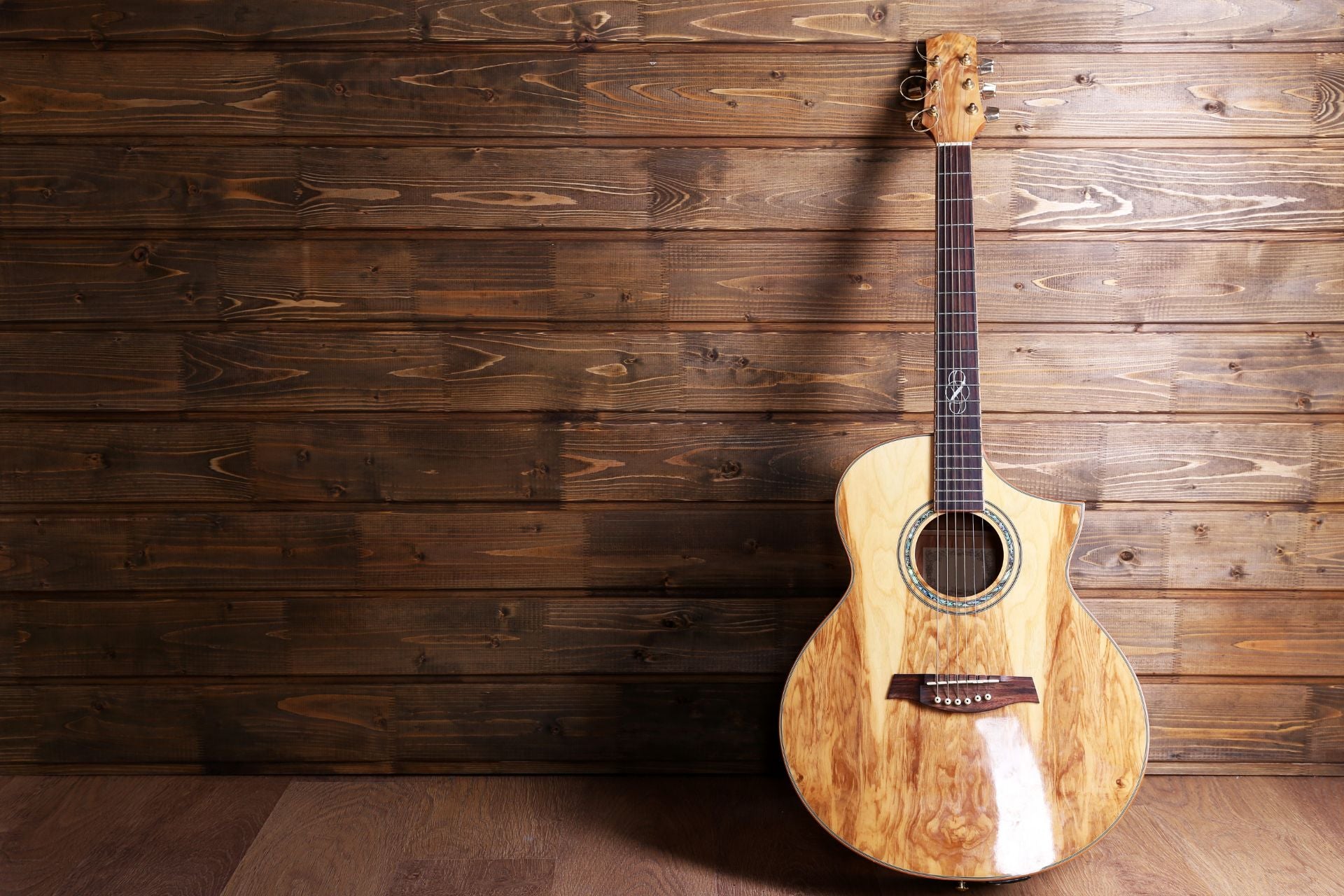 Mastering the Art of Acoustic Guitars: A Comprehensive Guide to History, Construction, and Playing Techniques